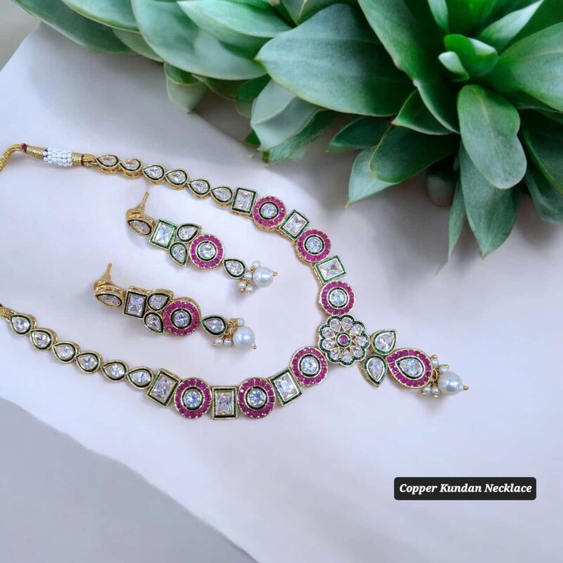 Premium Copper Kundan Necklace Set - Pink Sparkling Stones, and Green Enamel Premium Copper Kundan Necklace Set - Pink Sparkling Stones, and Green Enamel